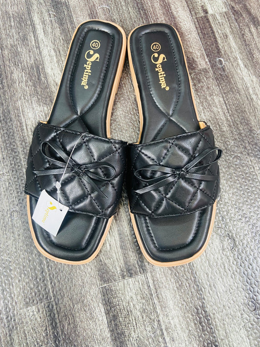 Black bow tie slip-ons